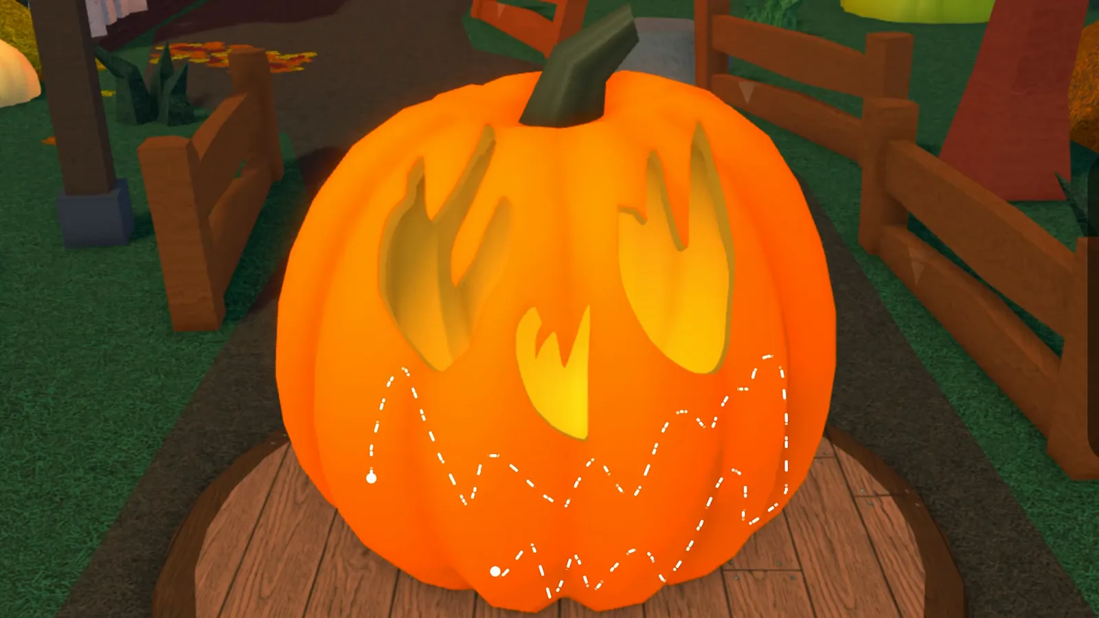 Carve a Pumpkin Roblox Fire theme carved flame eyes and glowing jagged tooth mouth after cut completes